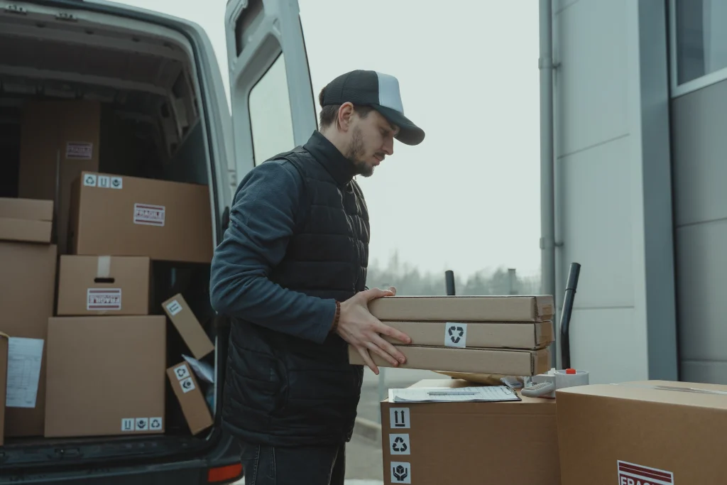 a delivery driver delivering some packages